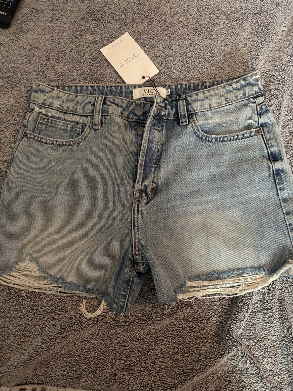VICI Light Wash Distressed Denim Cutoff Shorts